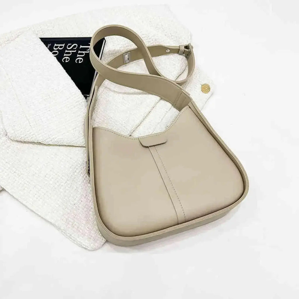 Women’s textured vegan leather crossbody handbag by Plush Fashion Hub, versatile shoulder purse with high-end design.