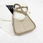 Women’s textured vegan leather crossbody handbag by Plush Fashion Hub, versatile shoulder purse with high-end design.