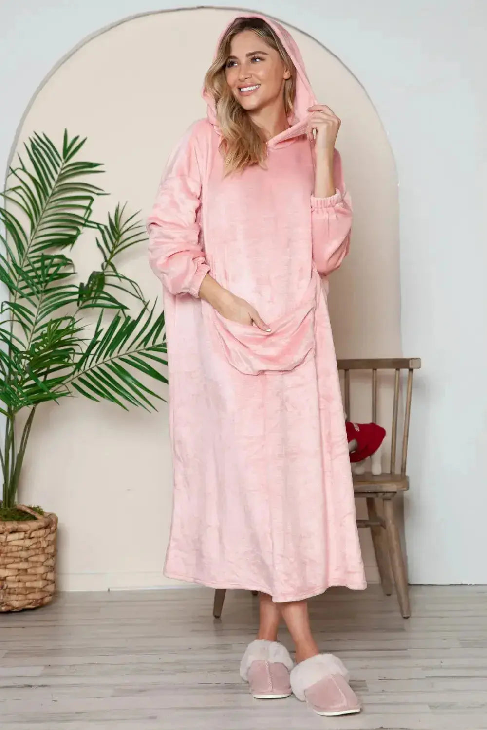Women’s hooded midi lounge dress with pockets, soft plush fabric, casual pajama style from Trendsi.