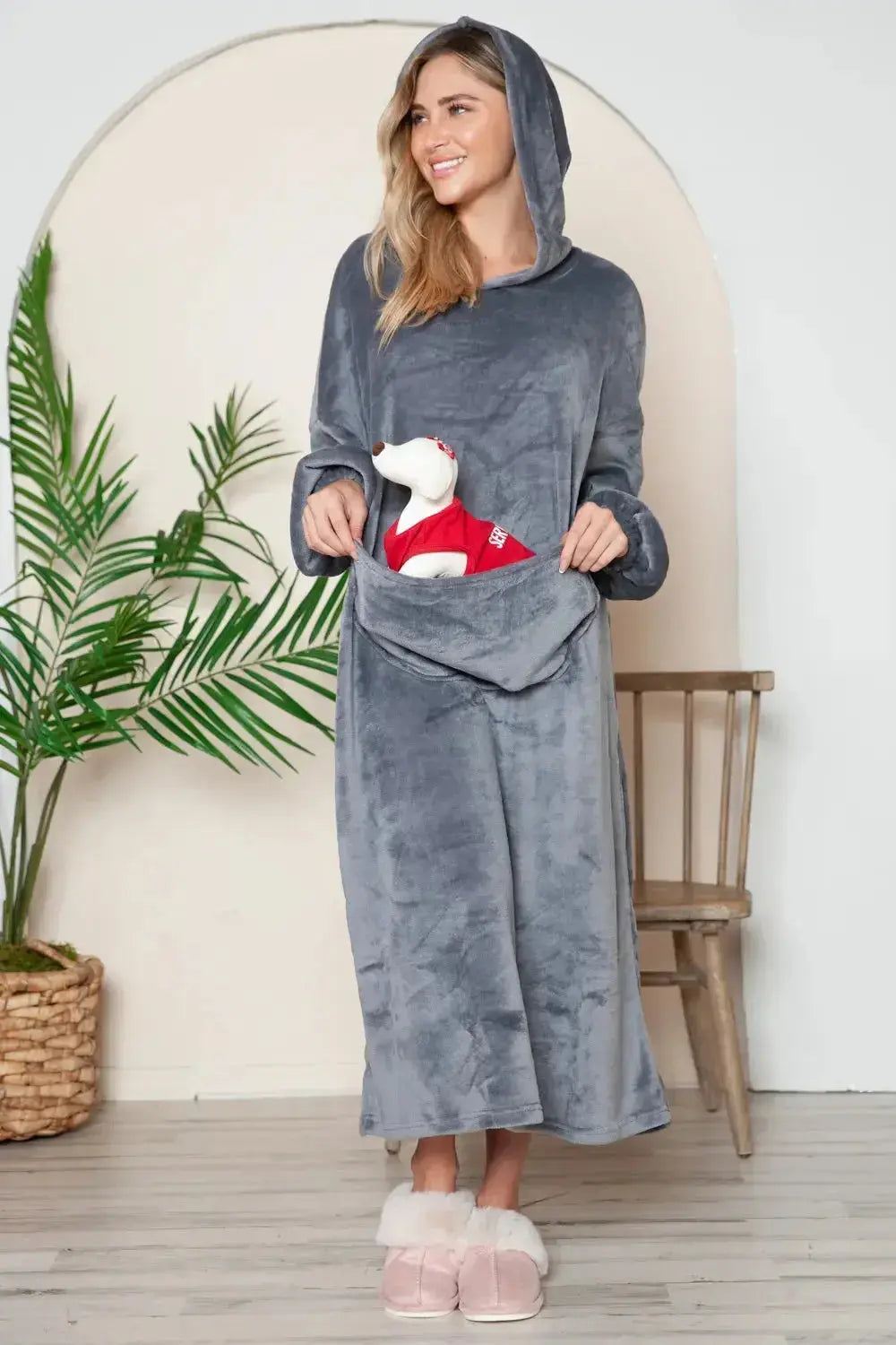 Women's hooded midi lounge dress with pockets, made of plush fabric by Trendsi, perfect for comfortable lounging.