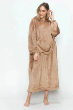 Women’s hooded midi lounge dress with pockets, made by Trendsi, featuring soft plush fabric and casual pajama style.