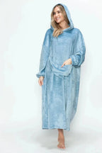 Women’s hooded midi lounge dress with pockets, plush fabric, perfect for cozy pajamas from Trendsi.