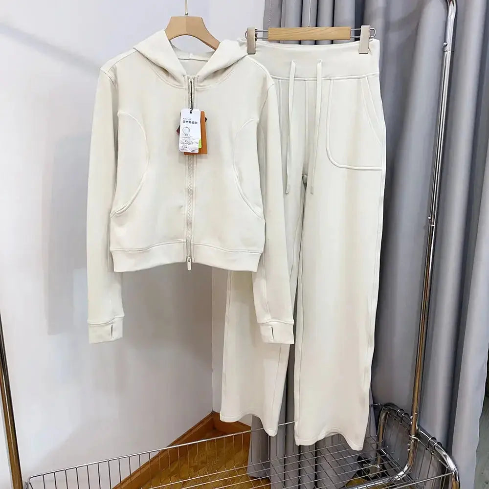 Women’s hooded sweatshirt and wide-leg pants lounge set by Plush Fashion Hub, cozy and stylish sweatsuit for comfortable casual wear.