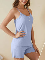 Women’s ribbed cami and shorts pajama lounge set with lace trim, featuring a comfortable and stylish sleepwear look.