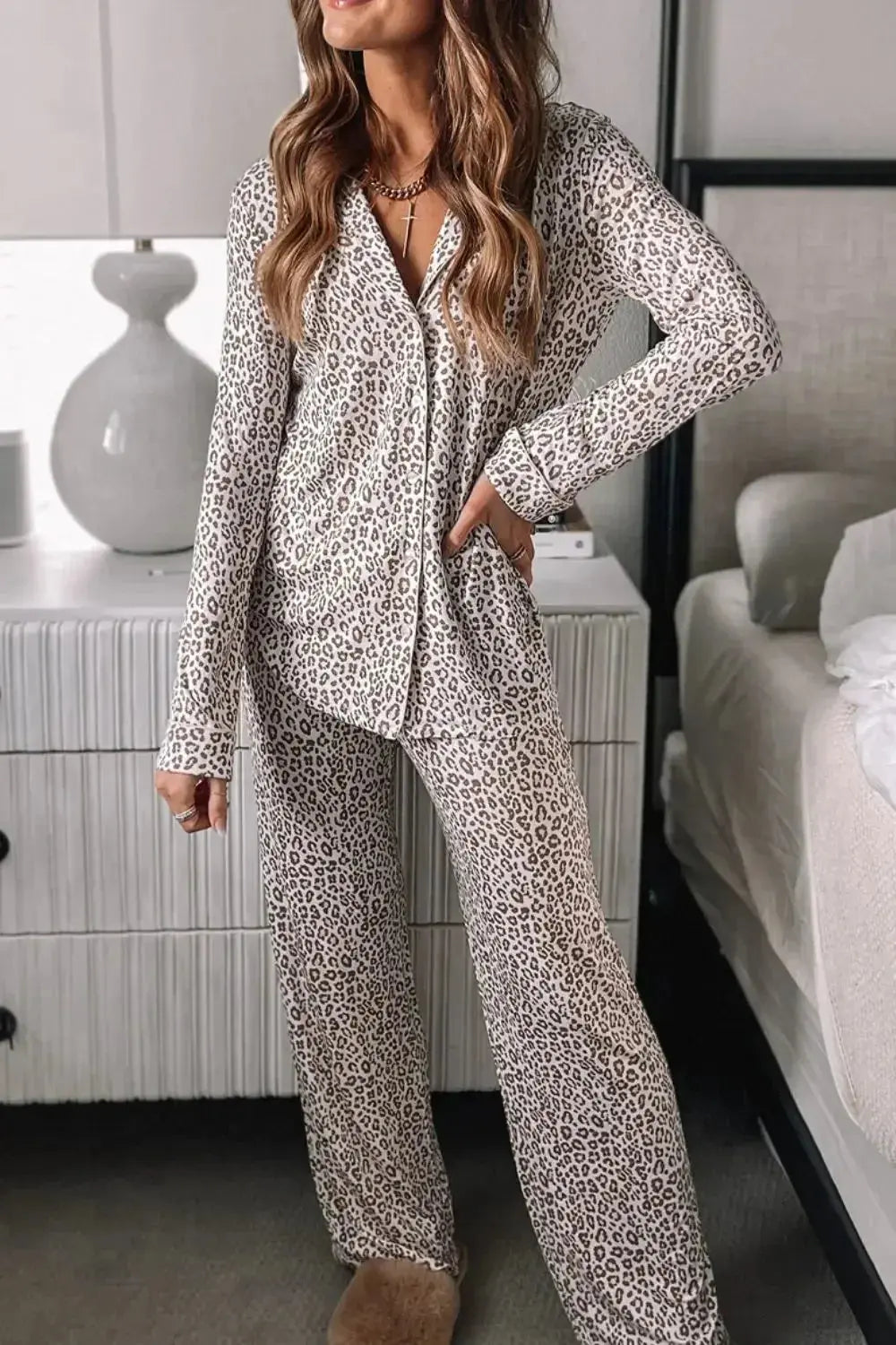 Women’s leopard print pajama lounge set with long sleeves and button-down shirt by Trendsi, shown on a model.