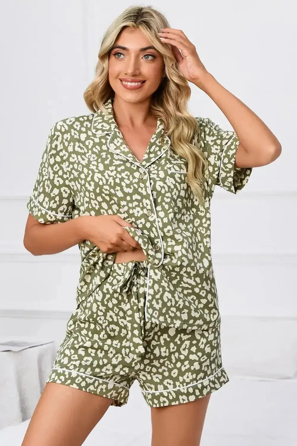 Women's leopard print pajama lounge set with button-down short sleeves, comfortable and stylish from Trendsi.
