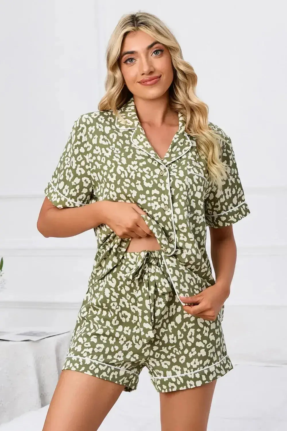 Women’s leopard print pajama lounge set with button-down short sleeves, stylish and comfortable for relaxing nights.