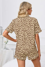 Women’s leopard print button-down short sleeve pajamas lounge set by Trendsi, featuring a comfortable and stylish sleepwear design.
