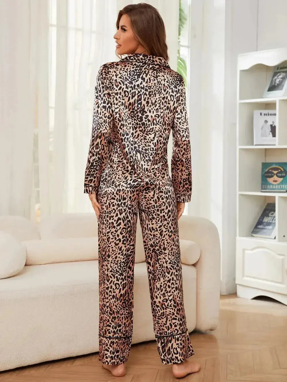 Women's leopard print long sleeve button-up pajama lounge set by Trendsi, featuring a stylish and comfortable design.