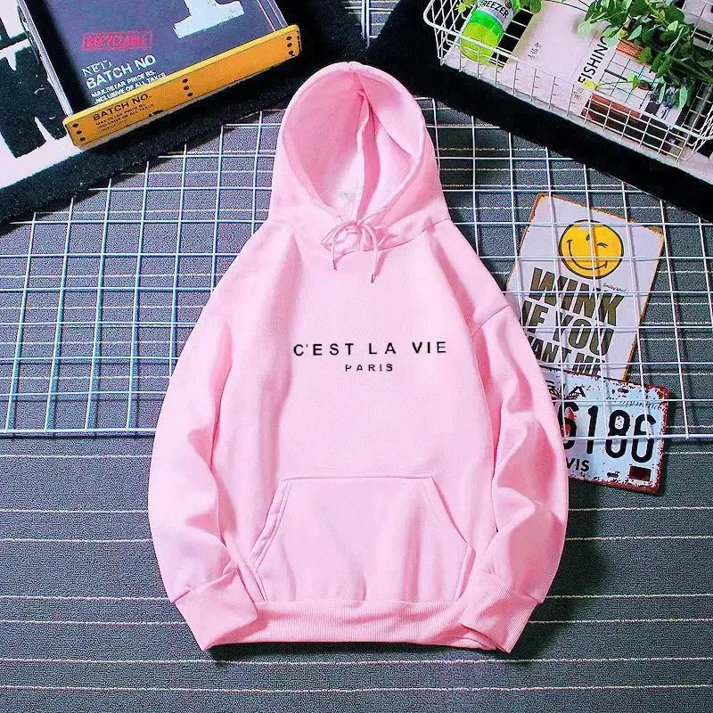 Women’s oversized graphic letter print hoodie by Plush Fashion Hub, cozy streetwear style with a relaxed fit and bold print design.