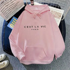 Women's oversized graphic hoodie by Plush Fashion Hub with letter print, cozy streetwear style, soft fabric, and relaxed fit.
