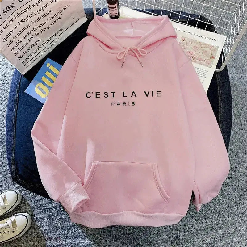 Women's oversized graphic hoodie by Plush Fashion Hub with letter print, cozy streetwear style, soft fabric, and relaxed fit.