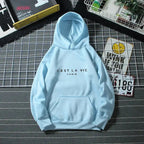 Women’s oversized graphic letter print hoodie from Plush Fashion Hub, cozy streetwear style with a relaxed fit.