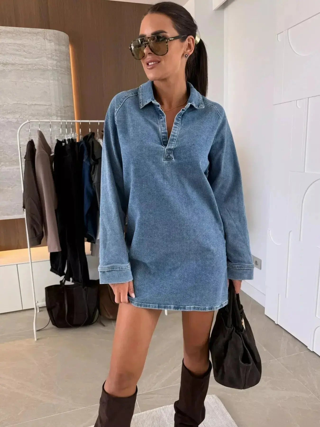 Women’s long sleeve collared denim dress by Trendsi, casual button-down midi style with a classic denim fabric.