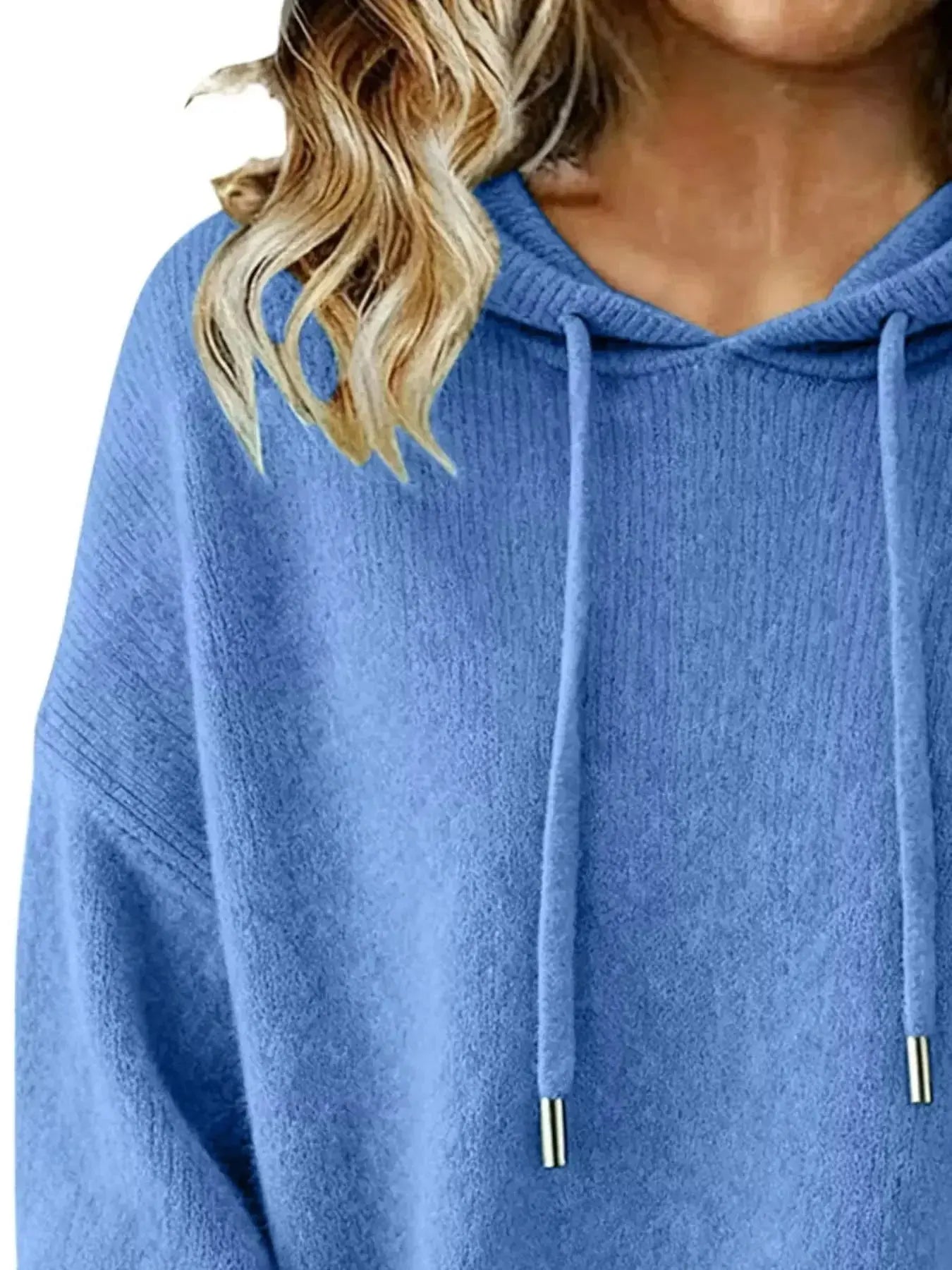 Women’s long sleeve drawstring hooded sweater by Trendsi, cozy casual pullover with a relaxed fit and stylish hood detail.