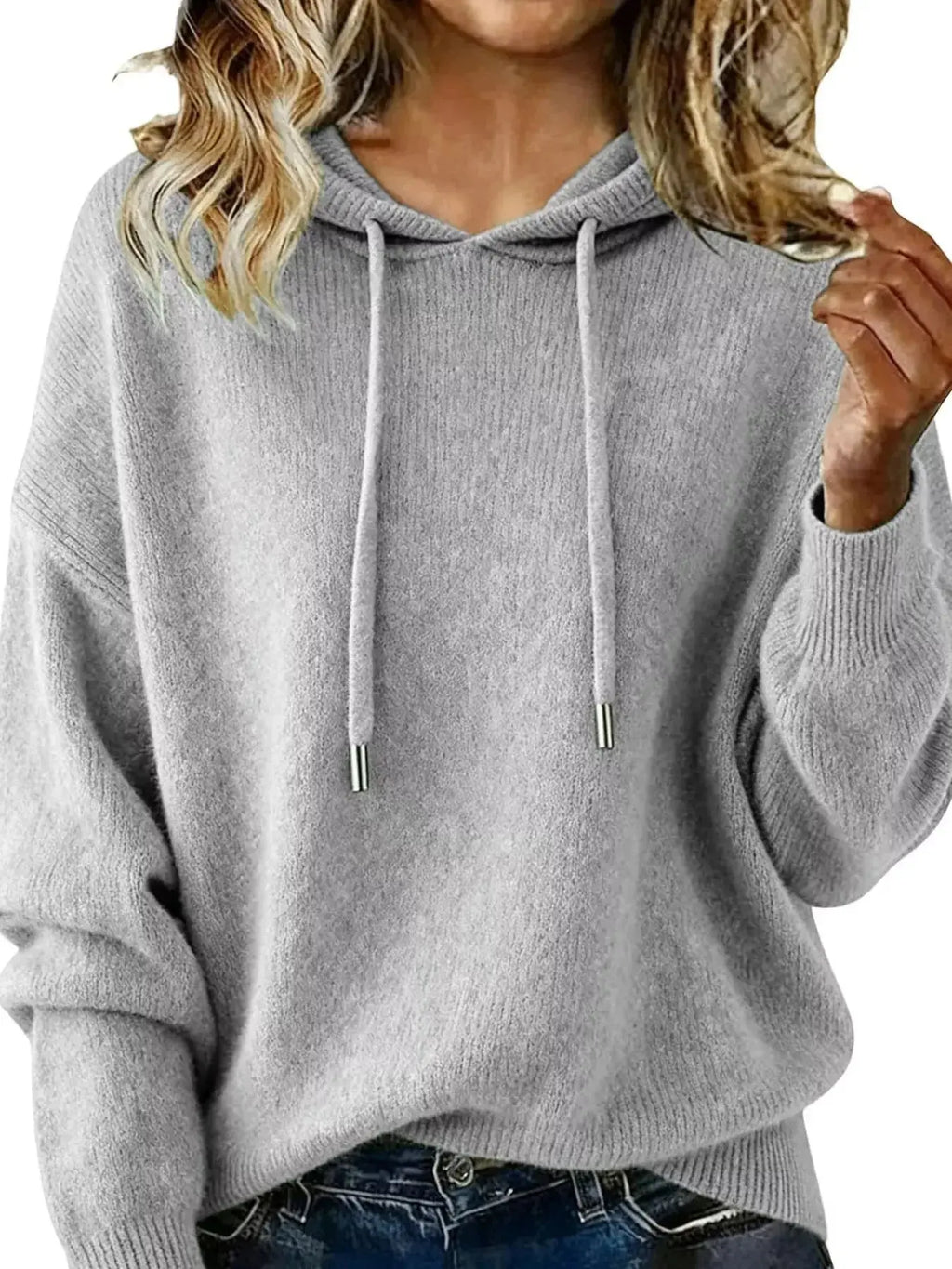 Women's long sleeve hooded sweater with drawstring, cozy casual pullover by Trendsi, perfect for comfortable everyday wear.