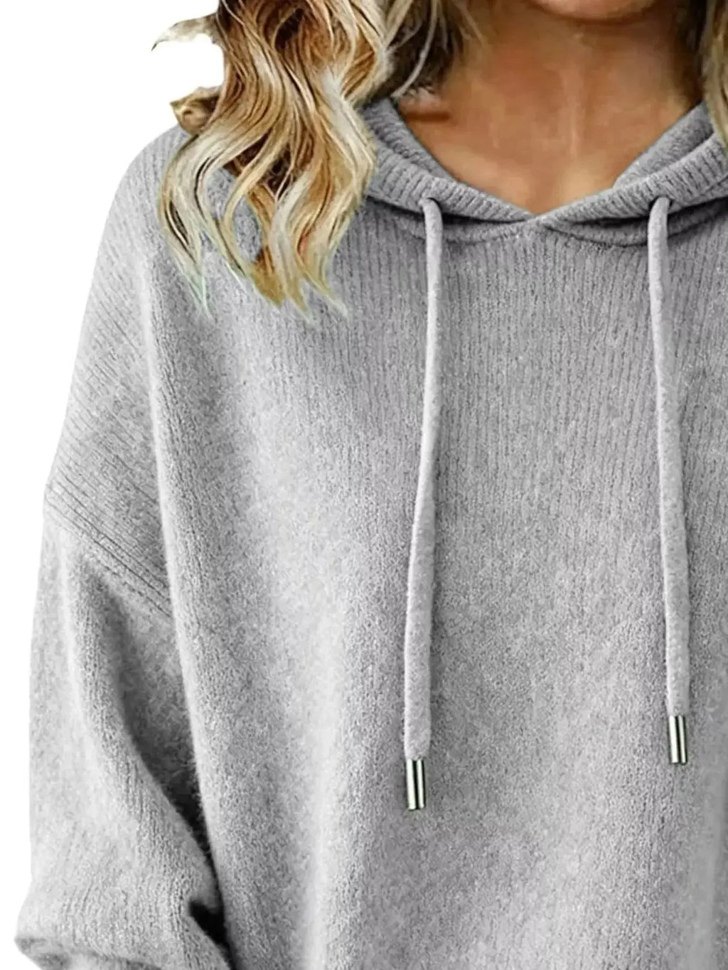 Women’s long sleeve drawstring hooded sweater by Trendsi, cozy casual pullover with relaxed fit and front pocket detail.