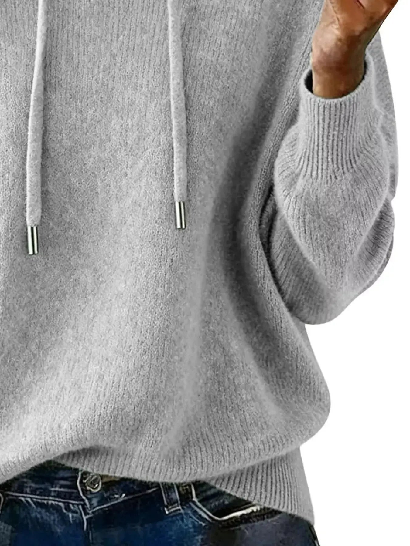 Women's long sleeve drawstring hooded sweater from Trendsi, cozy casual pullover with a relaxed fit and front pocket.