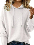 Women's long sleeve hooded sweater with drawstring, cozy casual pullover by Trendsi, ideal for comfortable everyday wear.