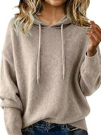 Women’s long sleeve drawstring hooded sweater by Trendsi, cozy casual pullover with a relaxed fit and front pocket.