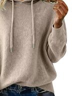 Women's long sleeve drawstring hooded sweater by Trendsi, cozy casual pullover with a relaxed fit and front pocket.