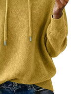 Women’s long sleeve drawstring hooded sweater by Trendsi, cozy casual pullover with a relaxed fit and front hood.