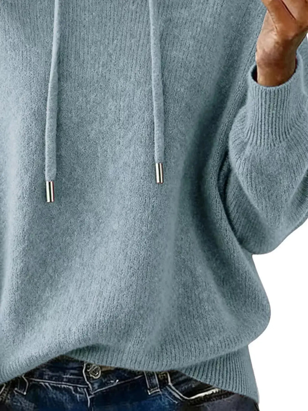 Women’s long sleeve hooded sweater with drawstring, cozy casual pullover by Trendsi, featuring a relaxed fit and soft fabric.