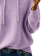 Women’s long sleeve drawstring hooded sweater by Trendsi, cozy casual pullover with a relaxed fit and front pocket.