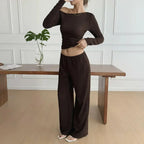 Women’s long sleeve knit two-piece lounge set by Plush Fashion Hub, featuring comfortable pants and a cozy top.