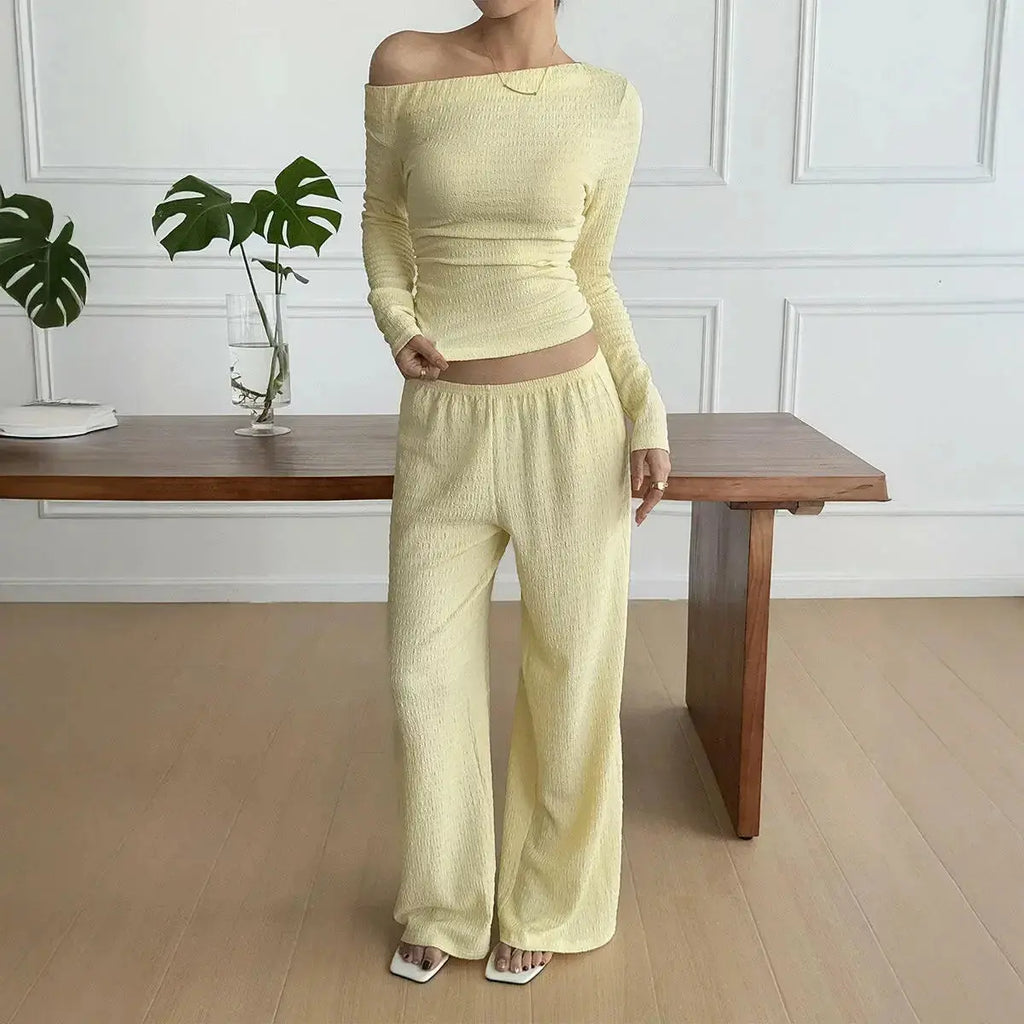 Women wearing Plush Fashion Hub long sleeve knit two-piece lounge set with matching pants, cozy and stylish for relaxed wear.