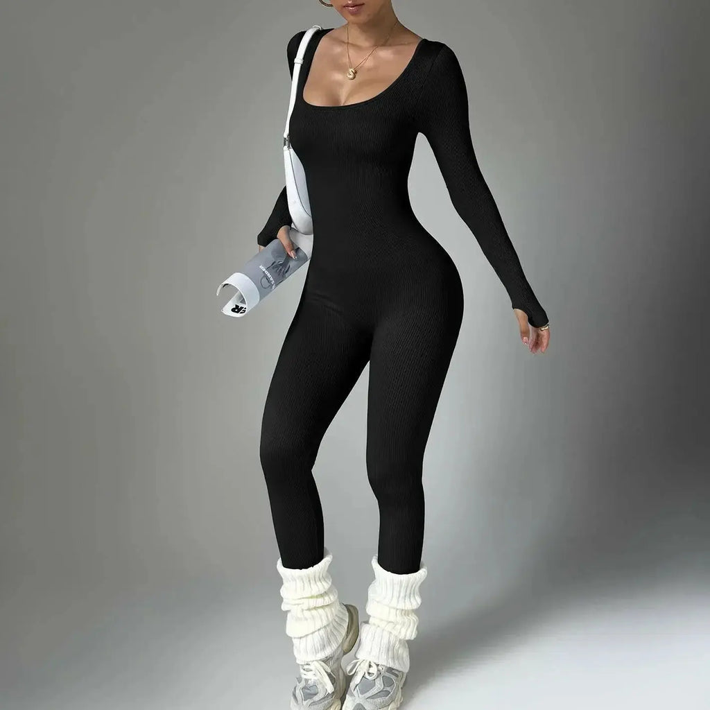 Women wearing Plush Fashion Hub long sleeve compression yoga suit, quick-dry fitness set for yoga and workout routines.