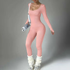 Women wearing Plush Fashion Hub long sleeve compression yoga suit, quick-dry fitness set for comfortable exercise and flexibility.