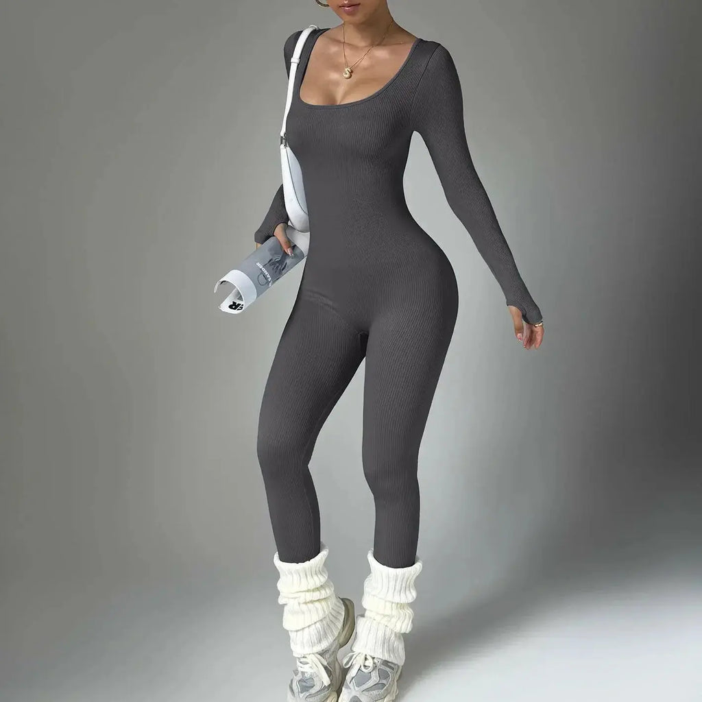 Women wearing Plush Fashion Hub long sleeve compression yoga suit, quick-dry fitness set, perfect for yoga and active workouts.