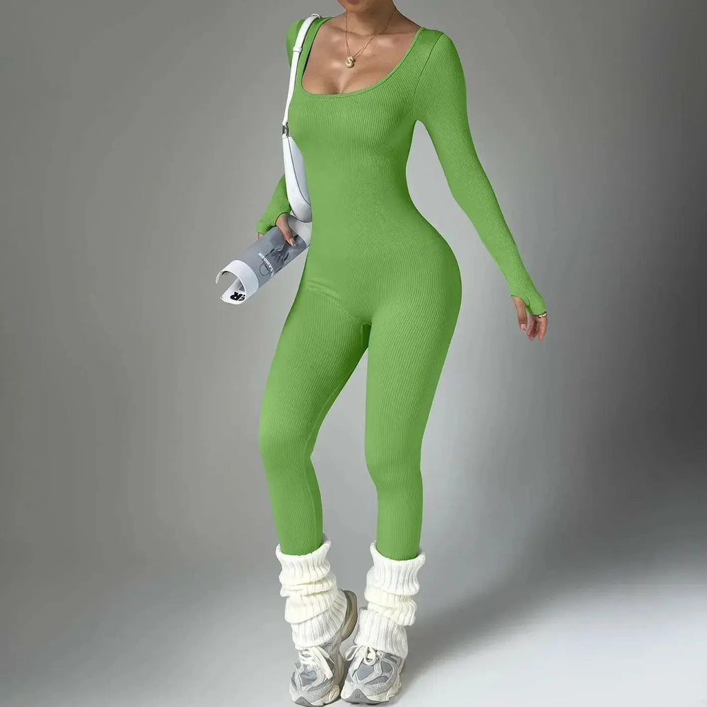 Women wearing Plush Fashion Hub long sleeve compression yoga suit, quick-dry fitness set, ideal for yoga and workout sessions.