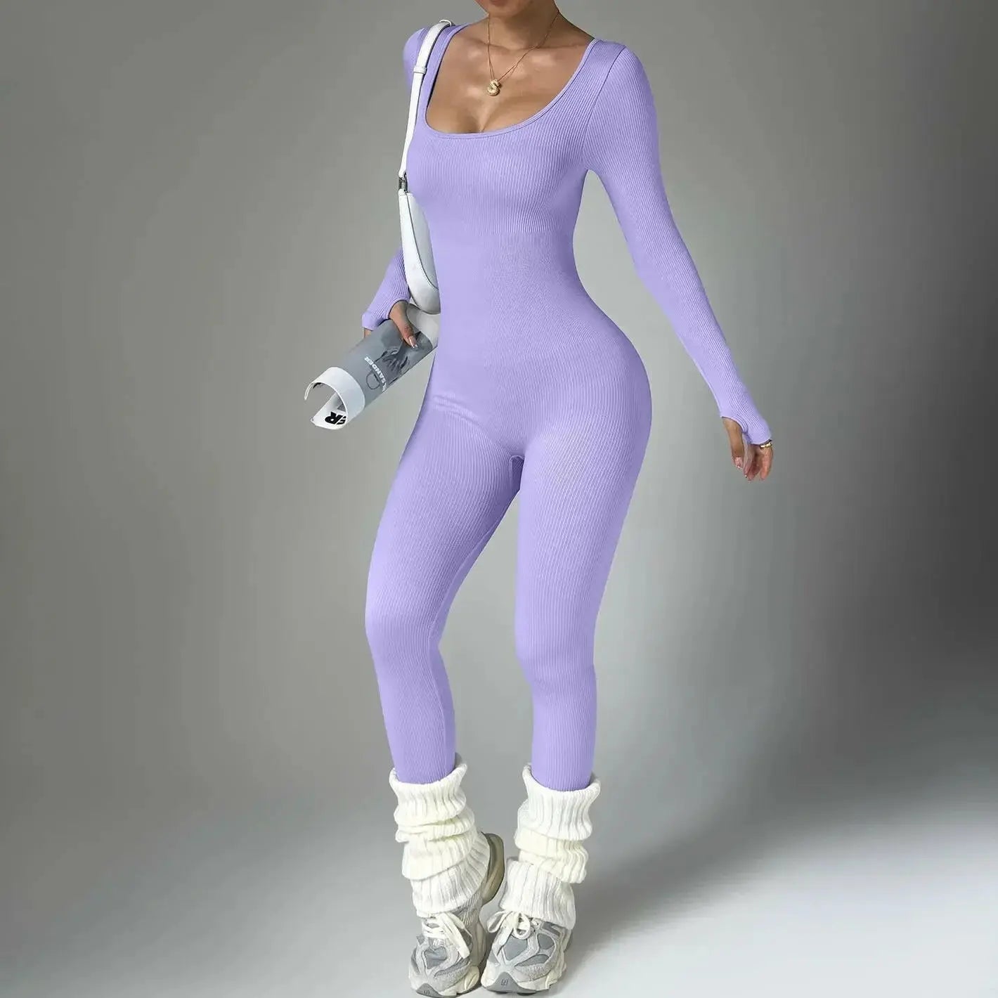 Women wearing Plush Fashion Hub women's long sleeve compression yoga suit, quick-dry fitness set for active yoga and workout sessions.