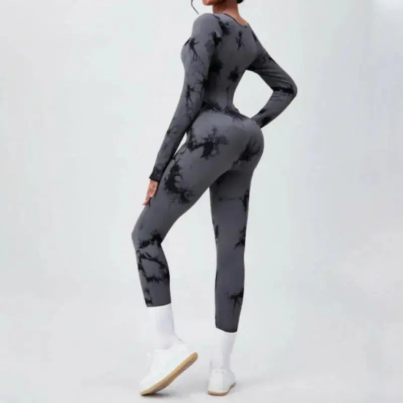 Women wearing Plush Fashion Hub long sleeve compression yoga suit, quick-dry fitness set for yoga and workout.