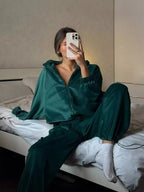 Women’s plush long sleeve zip-up jacket and pants lounge set by Trendsi, comfortable and stylish for relaxed wear.