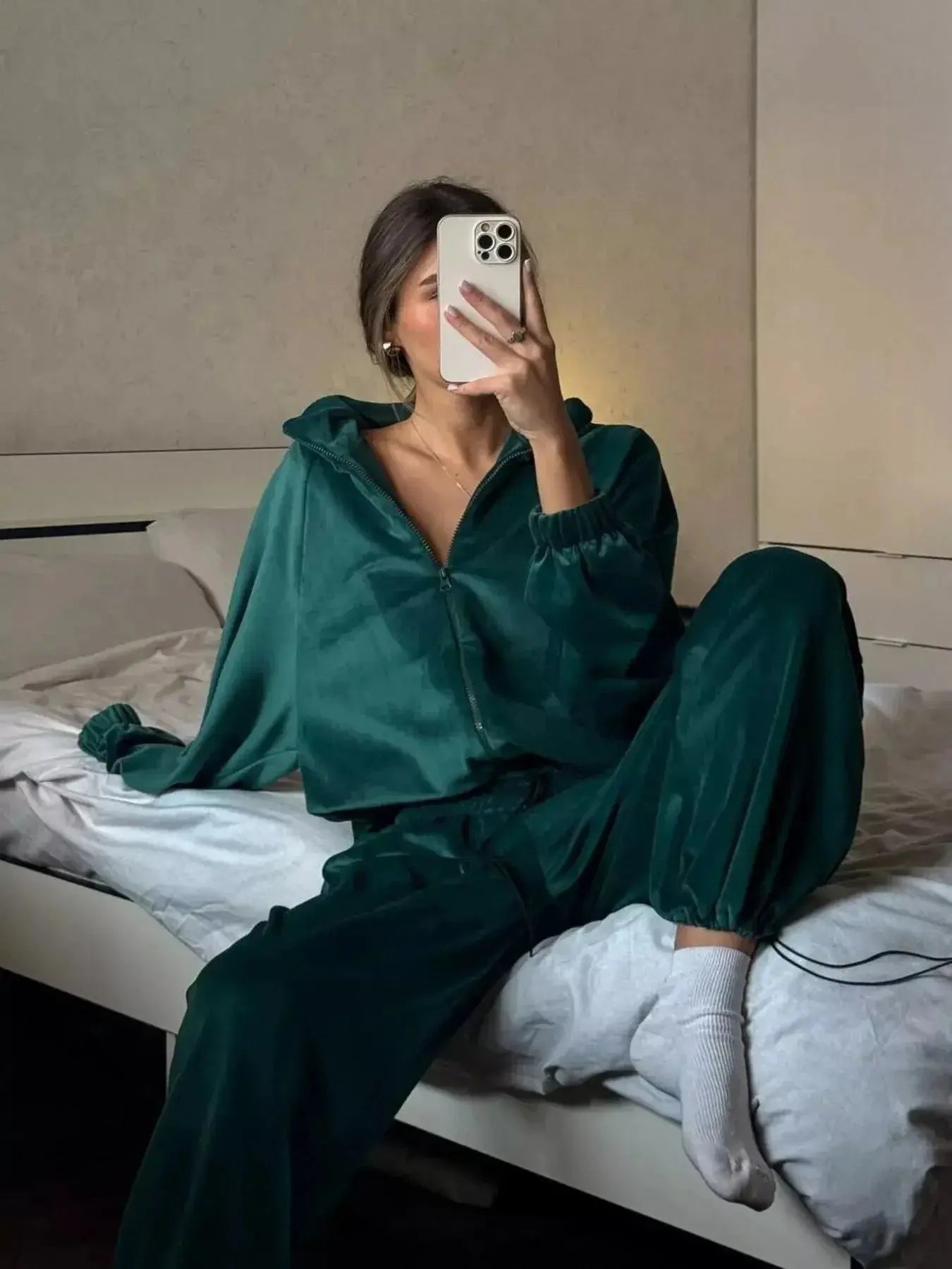 Women’s plush long sleeve zip-up jacket and pants lounge set by Trendsi, comfortable and stylish for relaxed wear.
