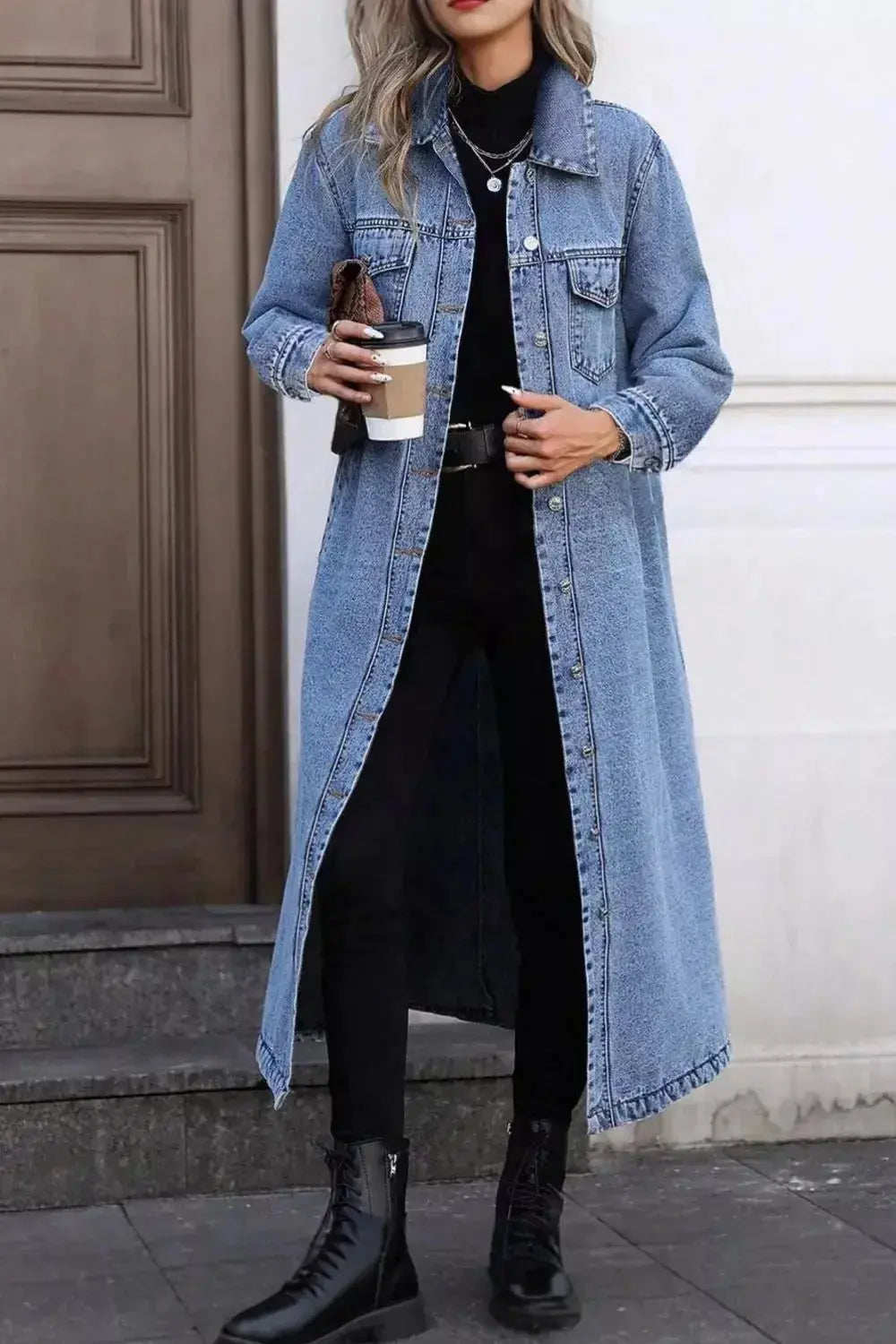 Women’s longline denim jacket by Trendsi featuring oversized fit, button-down front, and utility style in classic cotton denim fabric.