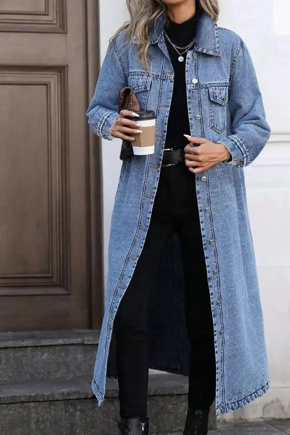 Women’s longline denim jacket by Trendsi featuring oversized fit, button-down front, and utility style in classic blue denim fabric.