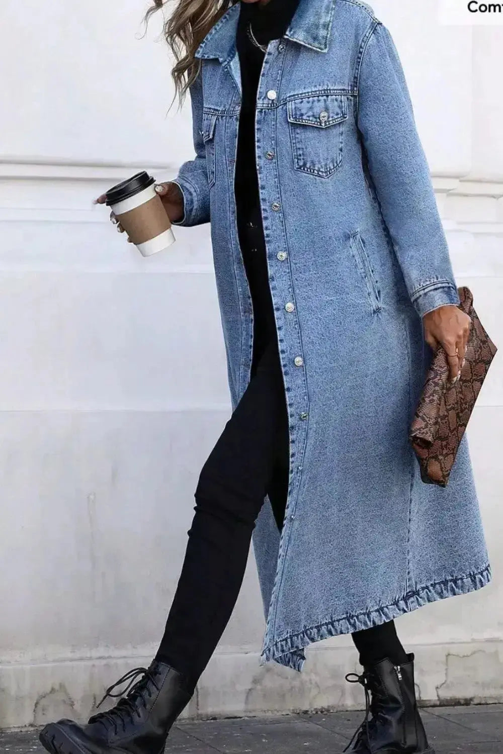 Women’s longline oversized denim jacket with button-down front and utility style, made of cotton fabric.
