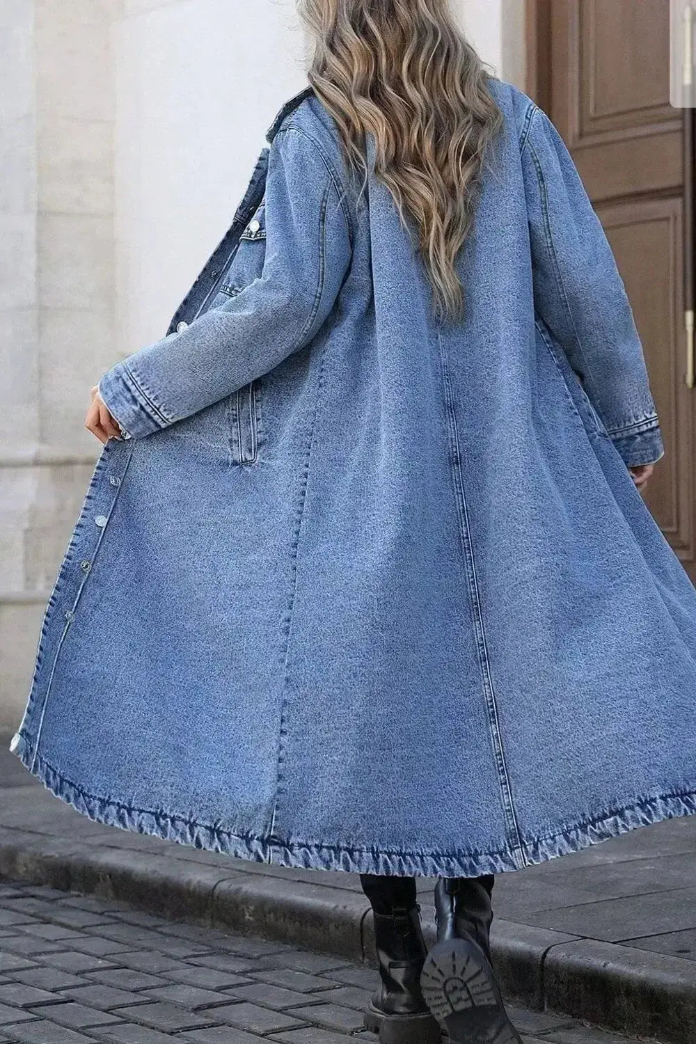 Women’s longline denim jacket by Trendsi featuring oversized fit, button-down front, and utility style in classic cotton denim.