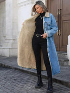 Women’s longline denim jacket with sherpa lining, cozy fall and winter outerwear from Trendsi, featuring classic denim style and warm interior.
