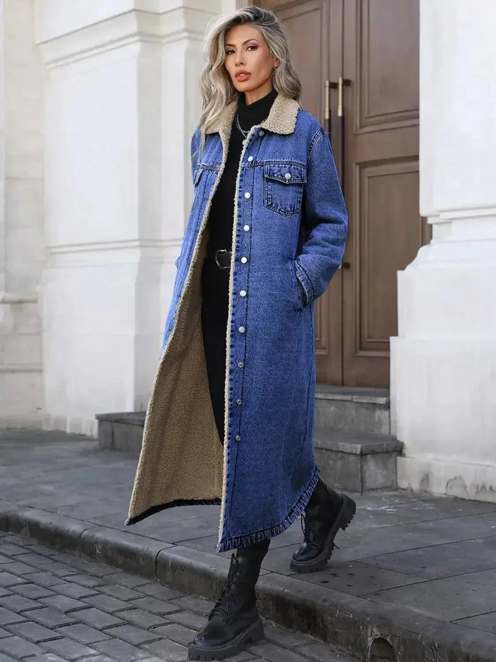 Women's longline denim jacket with sherpa lining by Trendsi, cozy fall and winter outerwear, stylish and warm for chilly days.
