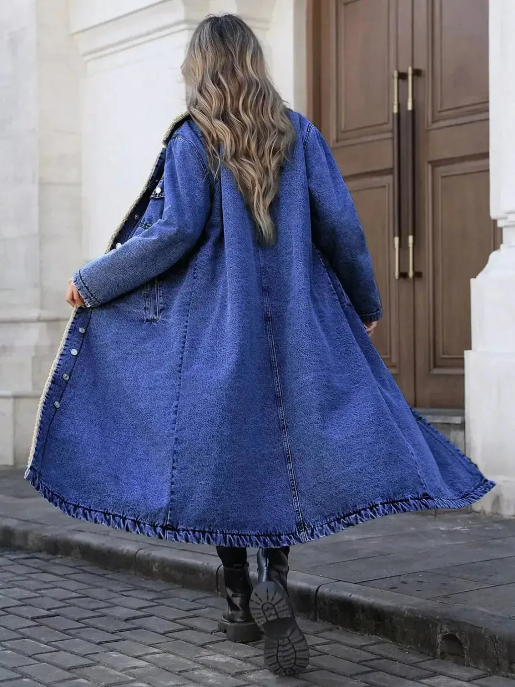 Women’s longline denim jacket with sherpa lining, cozy fall and winter outerwear from Trendsi.