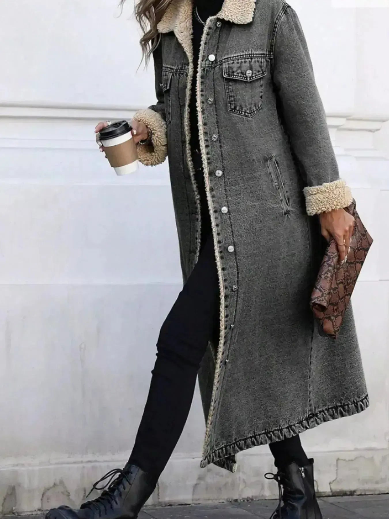 Women's longline denim jacket with sherpa lining, cozy fall and winter outerwear by Trendsi.