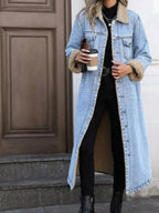 Women's longline denim jacket with cozy sherpa lining, stylish fall and winter outerwear by Trendsi
