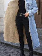 Women’s longline denim jacket with sherpa lining, cozy fall and winter outerwear by Trendsi, featuring classic denim style and warm interior.