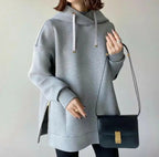 Women’s hooded knit sweater with side zipper, relaxed fit, solid color, from Plush Fashion Hub.