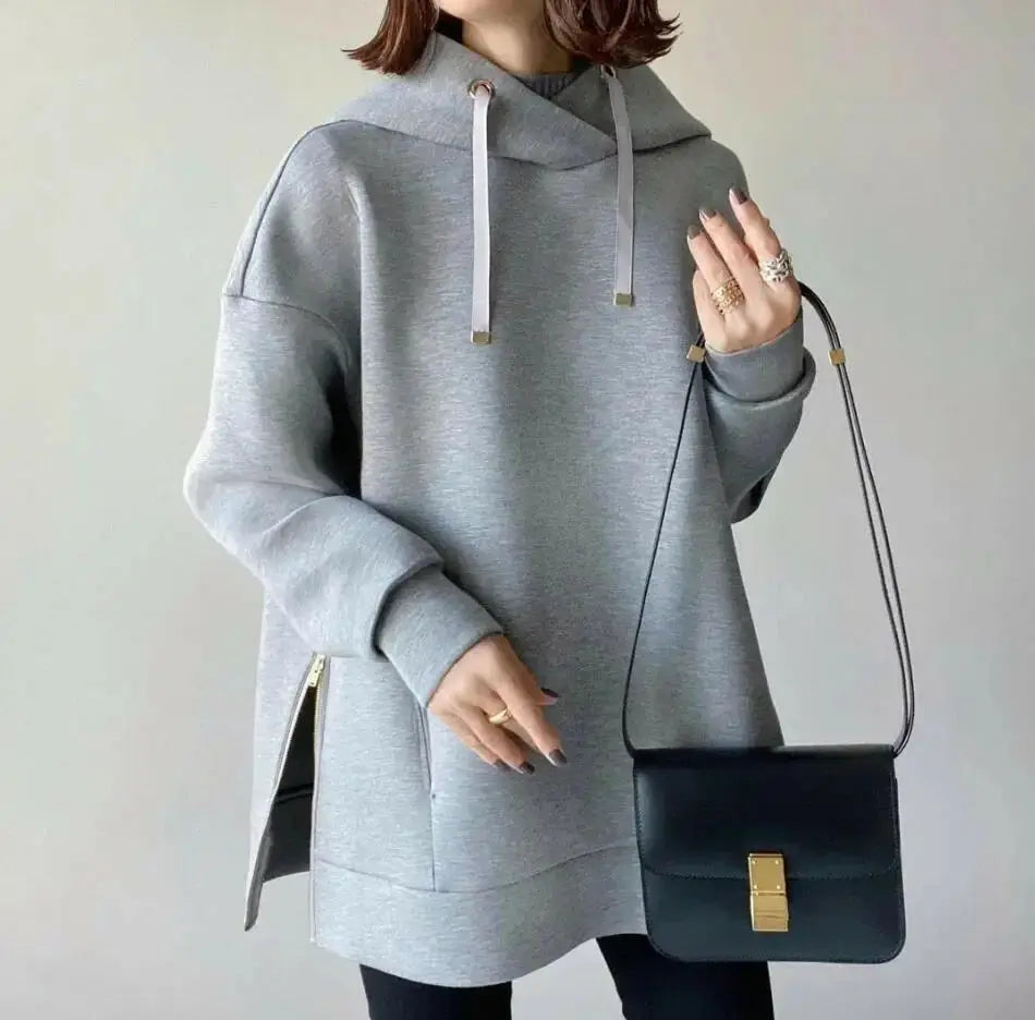 Women’s hooded knit sweater with side zipper, relaxed fit, solid color, from Plush Fashion Hub.
